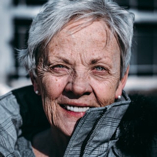 Portrait of Dorothy M., a smiling woman in her seventies